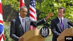 Presiden AS, Barack Obama dan PM Inggris David Cameron dalam konferensi pers bersama di London (25/5).