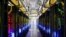 An undated file photo made available by Google shows the campus-network room at a data center in Council Bluffs, Iowa. 
