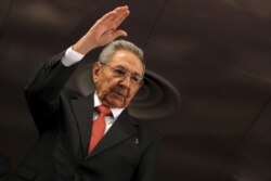 FILE - Cuban President Raul Castro waves at the Gran Teatro in Havana, Cuba, March 22, 2016.