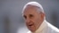FILE - Pope Francis arrives in St. Peter's square at the Vatican for his weekly general audience, Sept. 9, 2015.