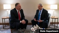 PM Israel Benjamin Netanyahu (kanan) menerima Menlu AS Mike Pompeo di Lisabon, Portugal, 4 Desember 2019. (Credit: State Department)