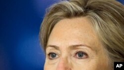 Anti-government protesters carry the body of Sadeq Mudiaha on January 12, 2012. Protesters say he was killed during clashes with government troops in Homs. (Reuters)