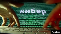 FILE - A computer screen displays cyber code in this picture illustration taken October 4, 2018. 