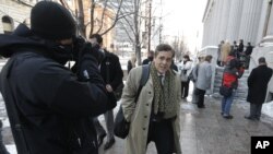 FILE - Jonathan Turley, attorney for Kody Brown and his four wives, the stars of the reality show "Sister Wives," leaves the Frank E. Moss United States Courthouse, in Salt Lake City, Utah, Jan. 17, 2013.
