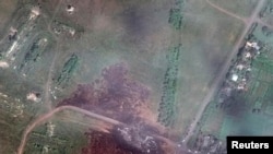 Ukraine -- A satellite image shows the crash site of Malaysia Airlines flight MH17 in Ukraine