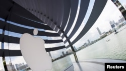 A logo of Apple is seen outside at the upcoming Apple Marina Bay Sands store in Singapore, Sept. 8, 2020. 