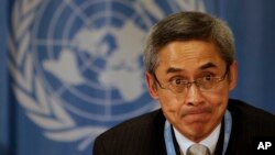 FILE - Then-U.N. human rights investigator Vitit Muntarbhorn gestures during a press conference at United Nations headquarters in Geneva, Switzerland, March 15, 2010.