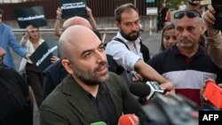 Italian journalist Roberto Saviano adresses the press on Oct. 12, 2023, after receiving a guilty verdict in a libel trial brought by Prime Minister Giorgia Meloni.