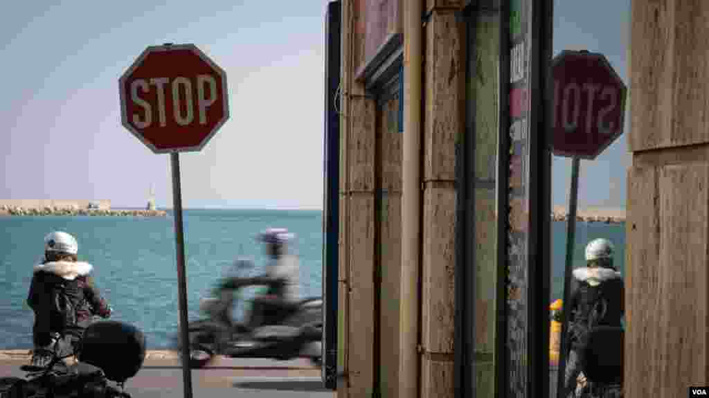 Along the seafront at Chios, an island in which refugees are stuck in the wake of the EU-Turkey deal in March. (J. Owens for VOA)