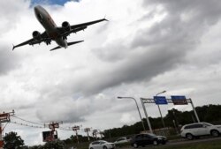 A Boeing 737 Max airplane of Brazilian airlines GOL Linhas Aereas prepares to land at Salgado Filho airport in Porto Alegre, Brazil, Dec. 9, 2020.
