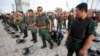 Riot police officers attend a training session ahead of demonstrations in central Phnom Penh, file photo. 
