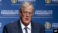 FILE - David Koch speaks in Orlando, Florida, Aug. 30, 2013.
