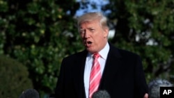 President Donald Trump speaks to reporters before leaving the White House, Nov. 21, 2017, in Washington, for a Thanksgiving trip to Mar-a-Lago estate in Palm Beach, Fla. Silent for more than a week, Trump all but endorsed embattled Alabama Republican Sena