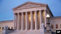 FILE - The U.S. Supreme Court building at dusk on Capitol Hill in Washington. 