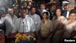 Sri Lanka's newly elected President Maithripala Sirisena (C) speaks during his swearing-in ceremony in Colombo, January 9, 2015.