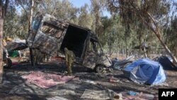 Izraelski vojnici na mjestu održavanja muzičkog festivala Supernova, gdje su pripadnici ekstremističkog pokreta Hamas ubili više od 260 civila (Foto: Menahem KAHANA/AFP)