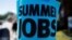 A sign advertising "Summer Jobs" hangs on a lamp post in Somerville, Massachusetts, U.S., June 15, 2016. 
