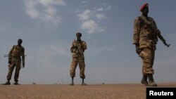 Sudan People's Liberation Army (SPLA) soldiers guard the airport in Malakal, Jan. 21, 2014. 