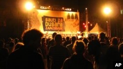 Festival goers crowd inside Stone Town's Old Fort at Sauti za Busara music festival, Stone Town, Zanzibar, February 9, 2012.