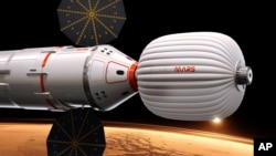 Gambar pesawat yang akan membawa awak ke Mars pada sebuah misi yang dimulai 2018 dan dibiayai jutawan Dennis Tito, turis antariksa pertama.(AP/Inspiration Mars)