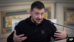 Ukrainian President Volodymyr Zelenskyy gestures as he speaks during an interview with The Associated Press in Kyiv, Ukraine, on Feb. 1, 2025.