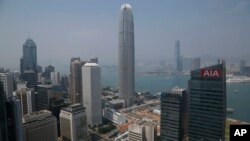 FILE - A general view of skyscrapers in Hong Kong. Some are beginning to question Hong Kong’s diminishing viability as a global financial center. 