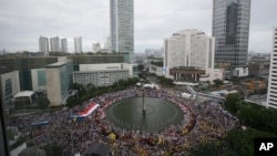 Indonesians gather during a rally in Jakarta, Indonesia, Dec. 4, 2016. Thousands of people staged the rally in attempt to demonstrate national unity as religious and racial tensions divide the world's most populous Muslim nation.