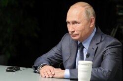 Russian President Vladimir Putin gives an interview with Al-Arabiya, Sky News Arabia and RT Arabic ahead of his visit to Saudi Arabia, in Sochi, in this picture released on Oct.13, 2019. (Sputnik/Mikhail Klimentyev/Kremlin via Reuters)