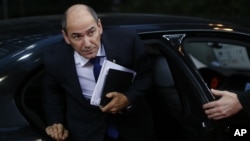 FILE - Slovenian Prime Minister Janez Jansa arrives for an EU summit at the EU Council building in Brussels, Nov. 22, 2012. 
