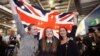 Supporters from the "No" Campaign celebrate as they hold up a Union flag, in Edinburgh, Scotland, Sept. 19, 2014.