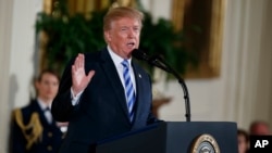 President Donald Trump speaks during the Public Safety Medal of Valor awards ceremony in the East Room of the White House, Feb. 20, 2018, in Washington.