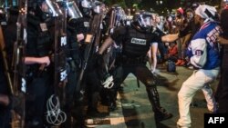 Protes atas tewasnya pria kulit hitam AS oleh polisi di Charlotte, North Carolina, Rabu (21/9). 
