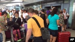 伦敦希思罗机场5号航站楼的旅客们。（2017年5月27日）