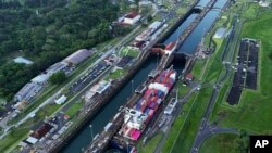 FILE - A cargo ship traverses the Agua Clara Locks of the Panama Canal in Colon, Panama, Sept. 2, 2024.