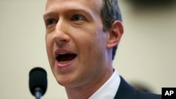Facebook CEO Mark Zuckerberg testifies before a House Financial Services Committee hearing on Capitol Hill in Washington, Oct. 23, 2019, on Facebook's impact on the financial services and housing sectors. 