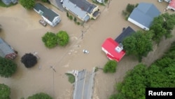 A general view of a flooded area, in Ludlow, Vermont, U.S. July 10, 2023, in this screen grab obtained from a social media video.