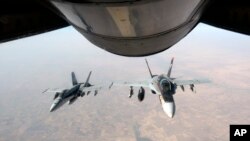 미 공군이 4일 공개한 ISIL에 대한 공습에 나선 미 전투기 모습 