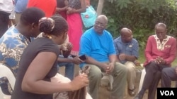 Shimmer Chinodya (in blue top) with other writers at Mungoshi's funeral wake Saturday.
