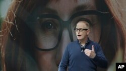 Dave Limp, senior vice president for Amazon devices and services, wears a pair of Echo Frames — eyewear enabled with the company's Alexa personal assistant technology — as he speaks, Sept. 25, 2019, during an event in Seattle. 