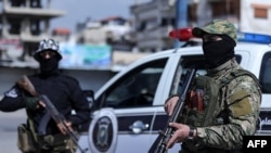 Bamwe mu bajejwe gukingira umutekano wa Siriya