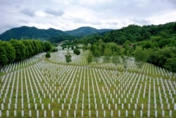 Gravestones are lined up at the memorial cemetery in Potocari, near Srebrenica, Bosnia, July 7, 2020.