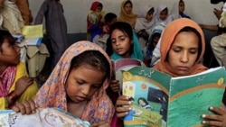 Pakistani girls in Peshawar last year. Their classes were held privately after Islamic militants reportedly blew up their school in an effort to prevent girls from getting an education.