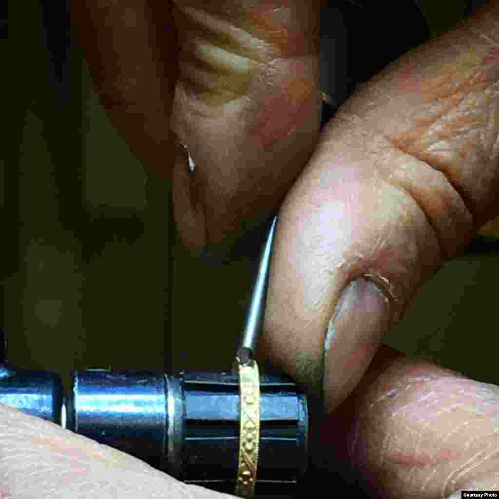 Kohl works intricate designs into a ring. (Courtesy Hugo Kohl)