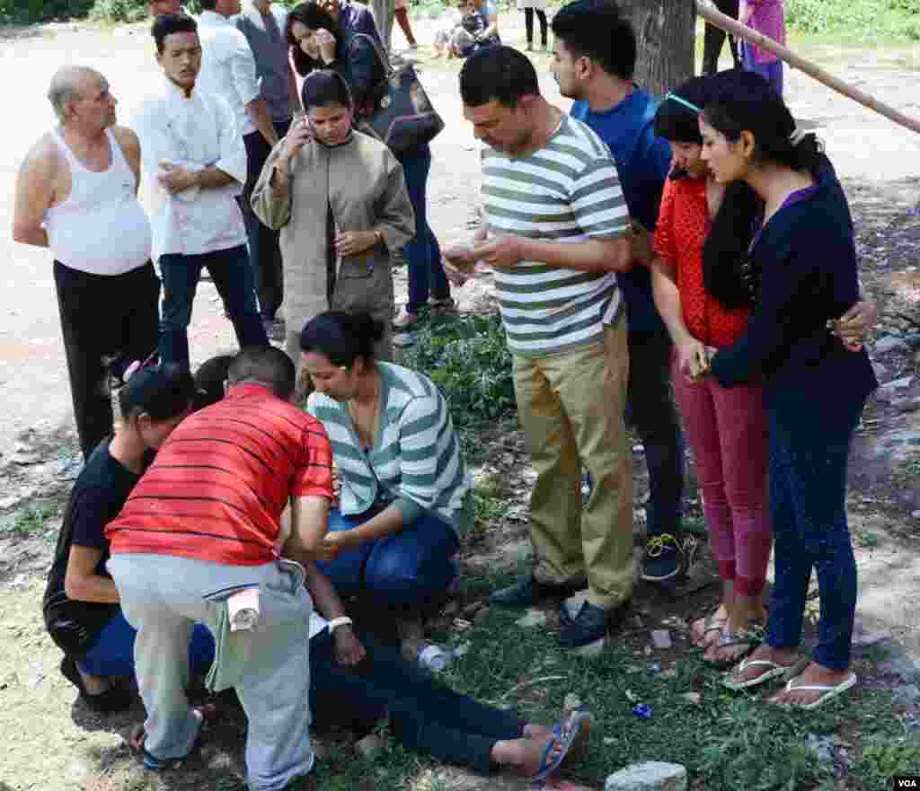 A displaced Iraqi woman covers her daughter during cold weather after fleeing the battle between Iraqi forces and Islamic State militants near Mosul.