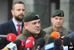 Chief of Poland's armed forces, General Wieslaw Kukula, tells reporters, "Everything indicates that a Russian missile intruded in Poland's airspace," following a national security meeting over the incident in Warsaw, Poland, on Dec. 29, 2023.