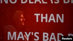 A pro-Brexit protester demonstrates outside the Houses of Parliament in London, Britain, April 1, 2019. 