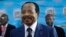 Cameroon's Incumbent President Paul Biya, of the Cameroon People's Democratic Movement party, waits to cast his vote during the presidential elections in Yaounde, Oct. 7, 2018.