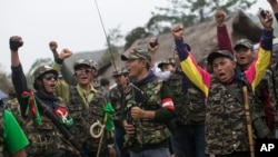 Members of community based anti-narcotic campaigners known as The Pat Jasan shout slogans protesting against the government’s ban prohibiting the group from destroying poppy farms in Wai Maw, northern Kachin State, Myanmar, Feb. 21, 2016.
