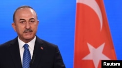 Menteri Luar Negeri Turki, Mevlut Cavusoglu. (Reuters/Annegret Hilse/Pool)