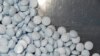 FILE - This photo provided by the U.S. Attorney's Office for Utah and introduced as evidence in a 2019 trial shows fentanyl-laced fake oxycodone pills collected during an investigation.